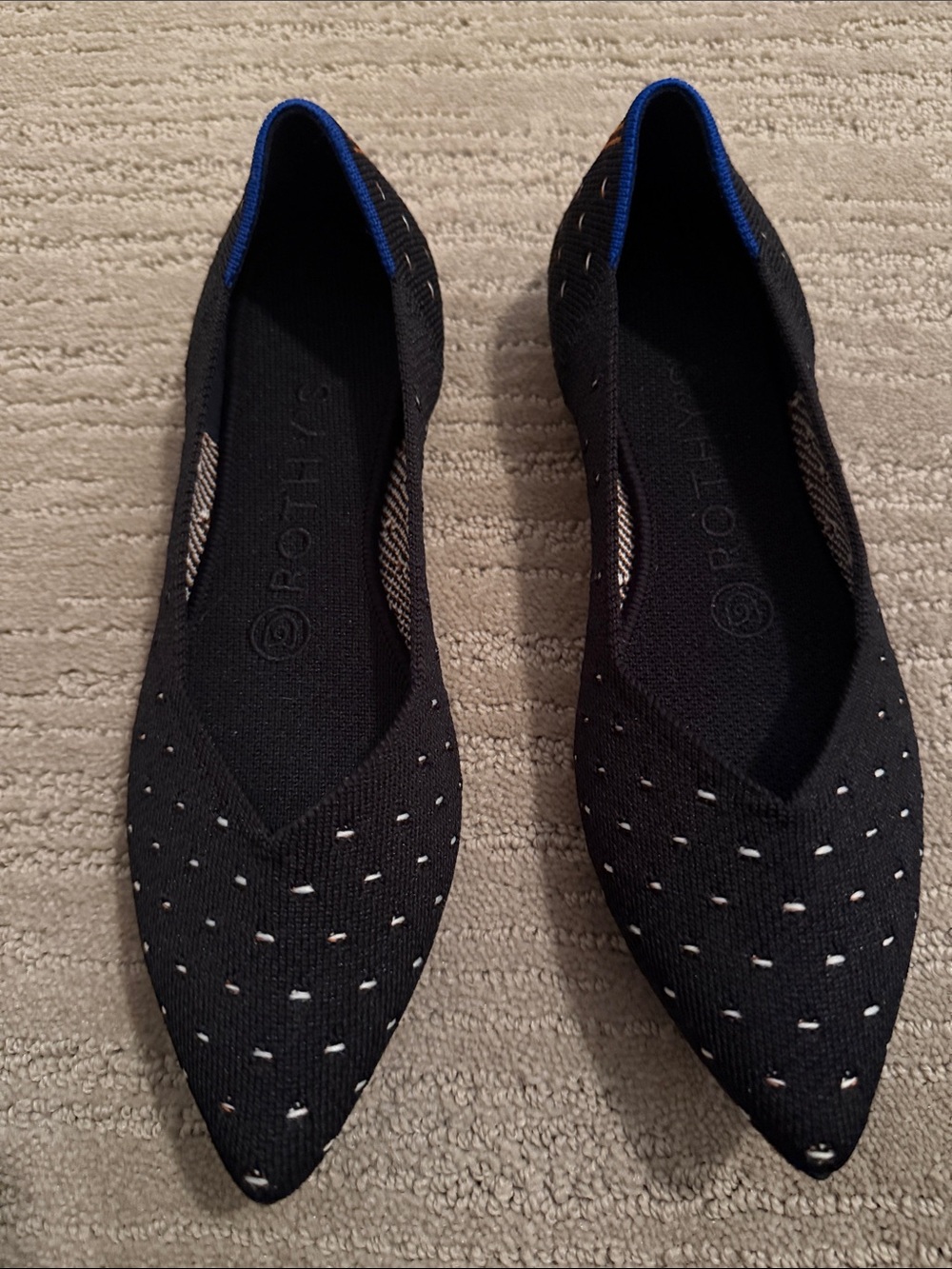 Rothy's Black Pointed Flats with Blue Trim